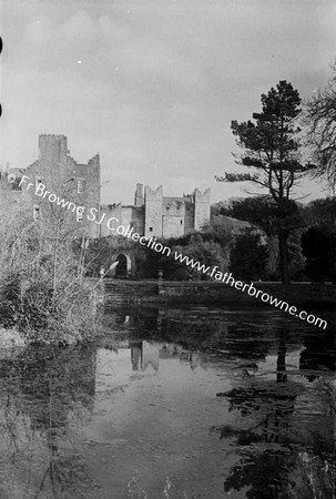 HOWTH CASTLE  LUTYEN'S TOWER (1911) AND STABLES FROM POND